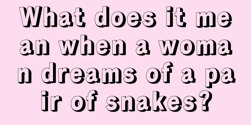 What does it mean when a woman dreams of a pair of snakes?