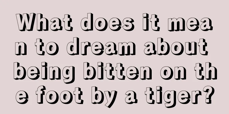 What does it mean to dream about being bitten on the foot by a tiger?