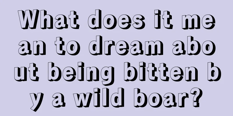 What does it mean to dream about being bitten by a wild boar?