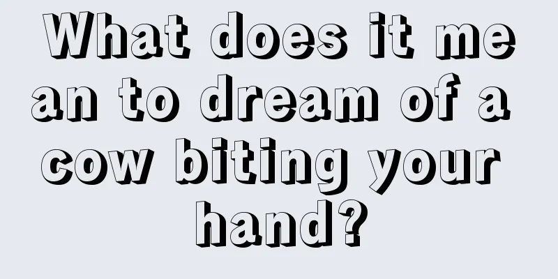 What does it mean to dream of a cow biting your hand?