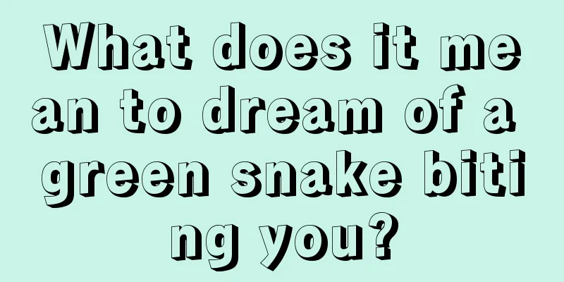 What does it mean to dream of a green snake biting you?