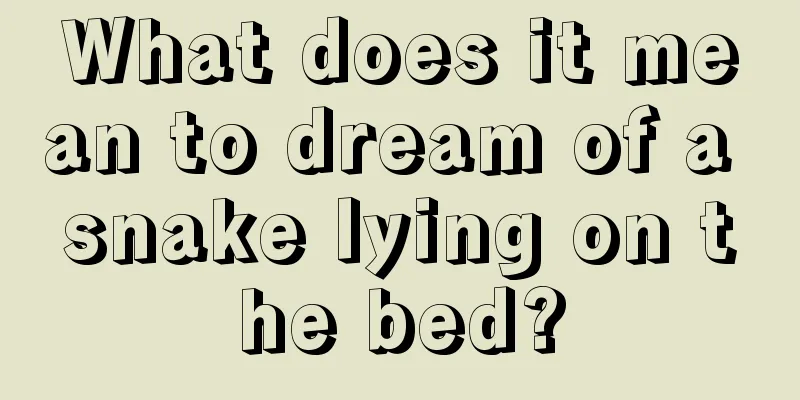 What does it mean to dream of a snake lying on the bed?