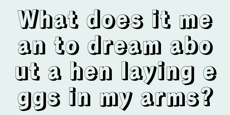 What does it mean to dream about a hen laying eggs in my arms?