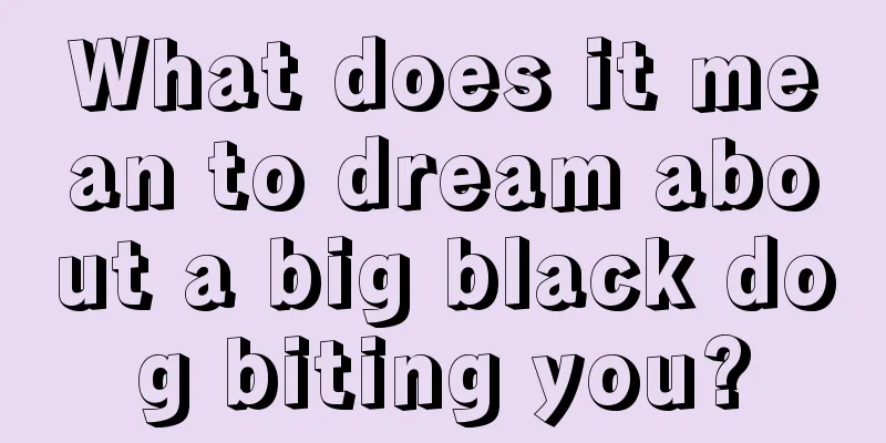 What does it mean to dream about a big black dog biting you?