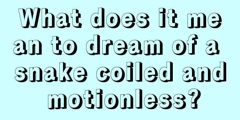 What does it mean to dream of a snake coiled and motionless?