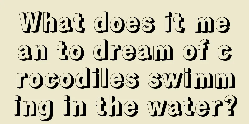 What does it mean to dream of crocodiles swimming in the water?