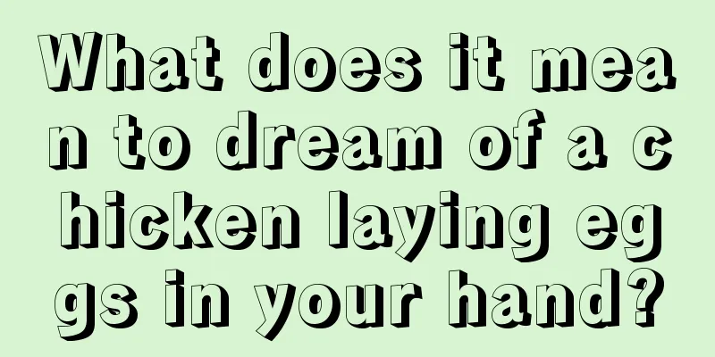 What does it mean to dream of a chicken laying eggs in your hand?