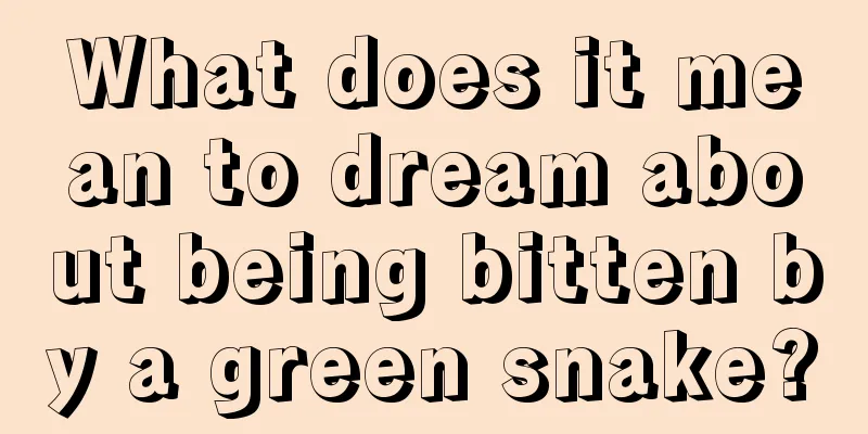 What does it mean to dream about being bitten by a green snake?