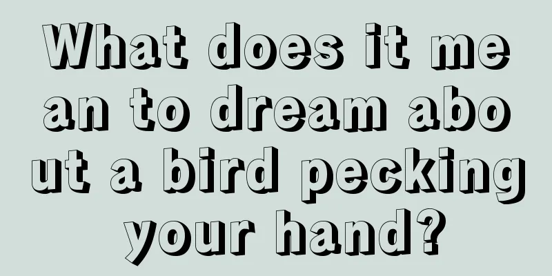 What does it mean to dream about a bird pecking your hand?