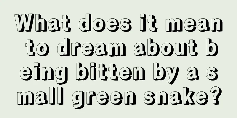 What does it mean to dream about being bitten by a small green snake?