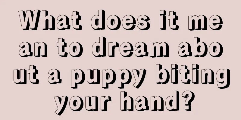 What does it mean to dream about a puppy biting your hand?