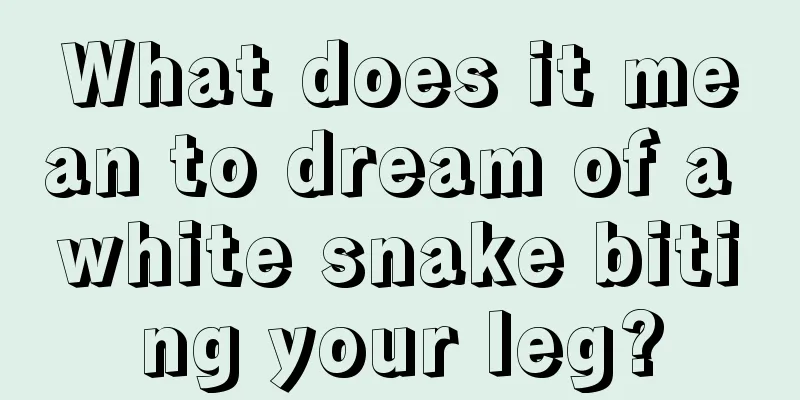 What does it mean to dream of a white snake biting your leg?