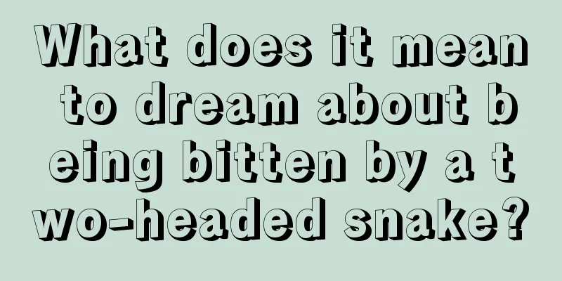 What does it mean to dream about being bitten by a two-headed snake?