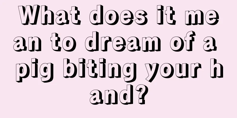 What does it mean to dream of a pig biting your hand?