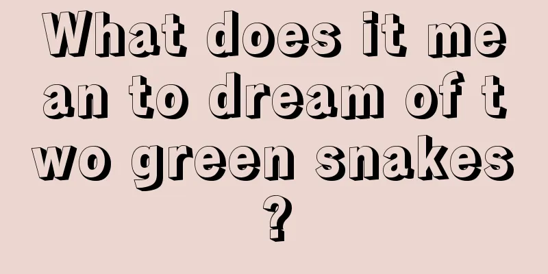 What does it mean to dream of two green snakes?