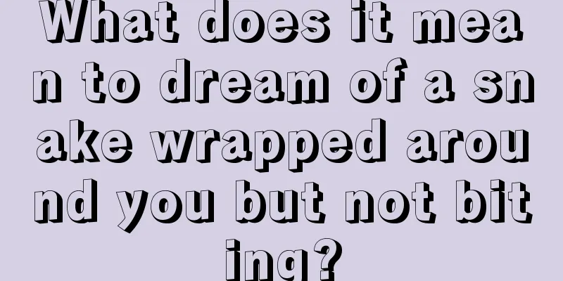 What does it mean to dream of a snake wrapped around you but not biting?