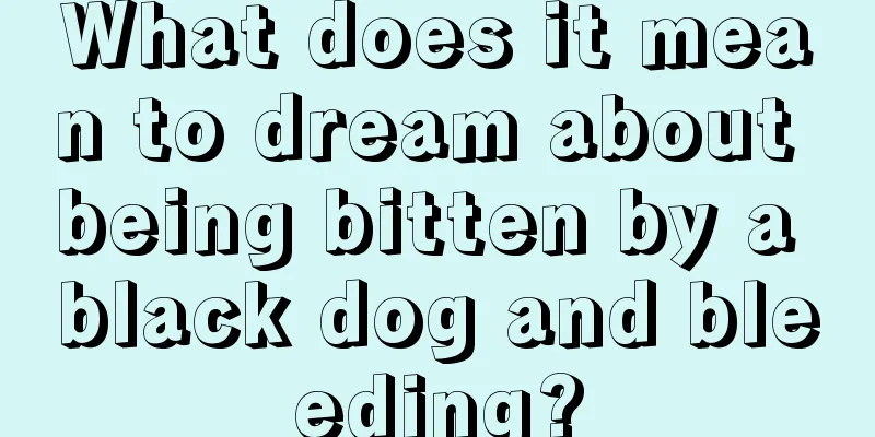 What does it mean to dream about being bitten by a black dog and bleeding?