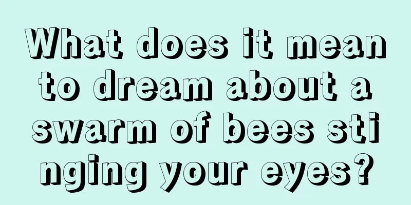 What does it mean to dream about a swarm of bees stinging your eyes?