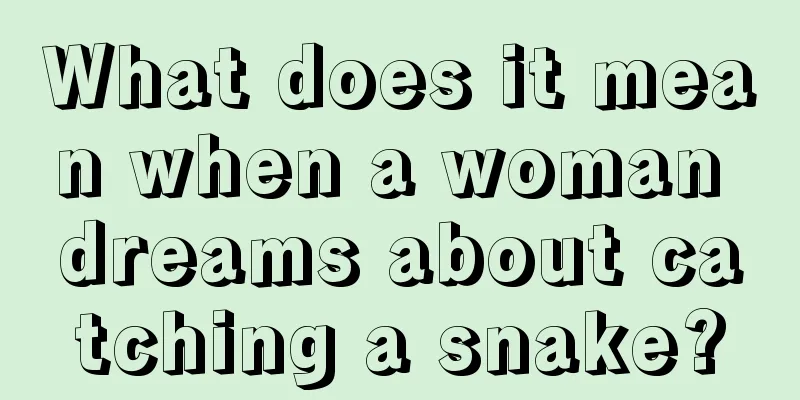 What does it mean when a woman dreams about catching a snake?