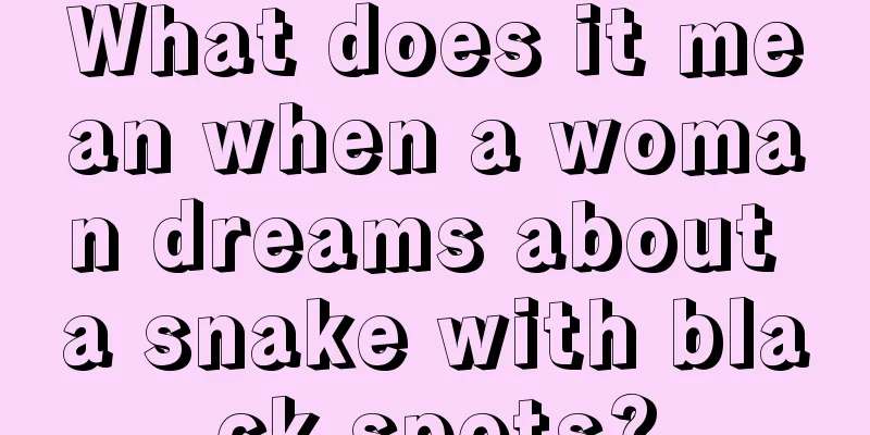 What does it mean when a woman dreams about a snake with black spots?