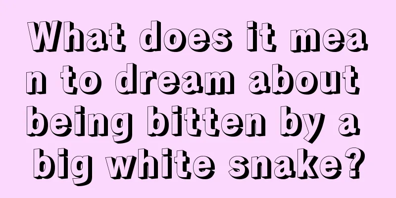 What does it mean to dream about being bitten by a big white snake?