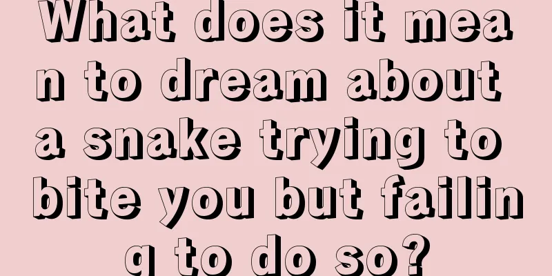 What does it mean to dream about a snake trying to bite you but failing to do so?