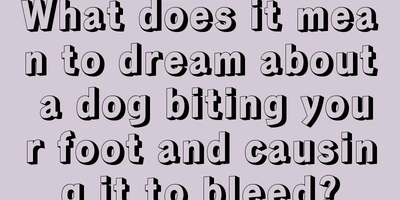 What does it mean to dream about a dog biting your foot and causing it to bleed?