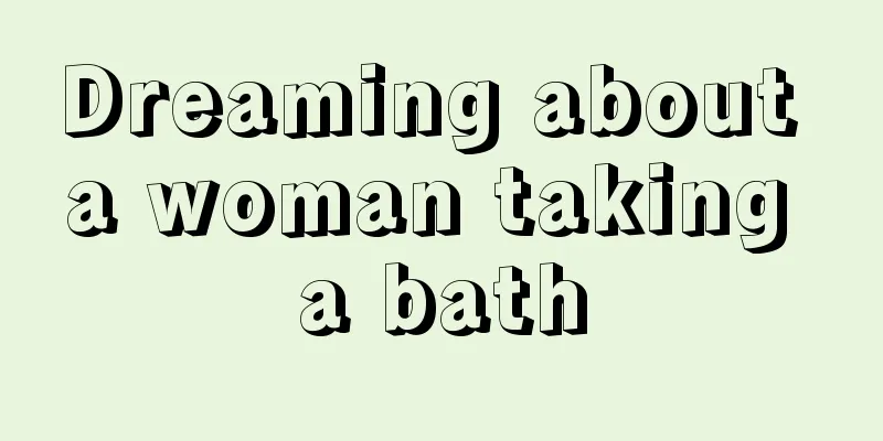 Dreaming about a woman taking a bath