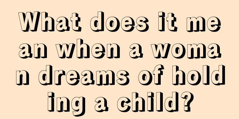 What does it mean when a woman dreams of holding a child?