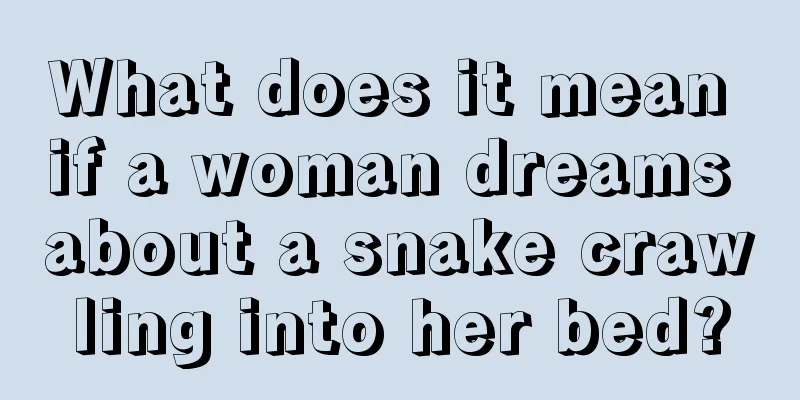 What does it mean if a woman dreams about a snake crawling into her bed?