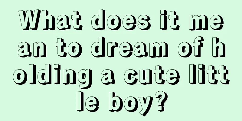 What does it mean to dream of holding a cute little boy?