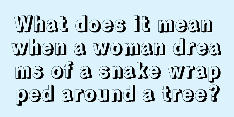 What does it mean when a woman dreams of a snake wrapped around a tree?