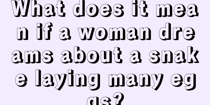 What does it mean if a woman dreams about a snake laying many eggs?