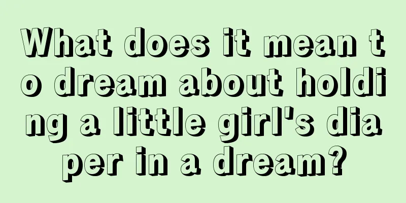 What does it mean to dream about holding a little girl's diaper in a dream?