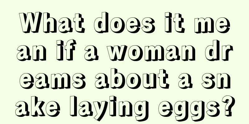 What does it mean if a woman dreams about a snake laying eggs?