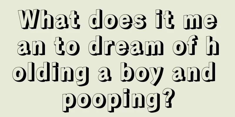 What does it mean to dream of holding a boy and pooping?