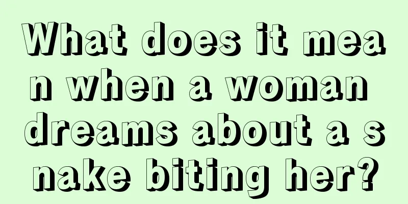 What does it mean when a woman dreams about a snake biting her?