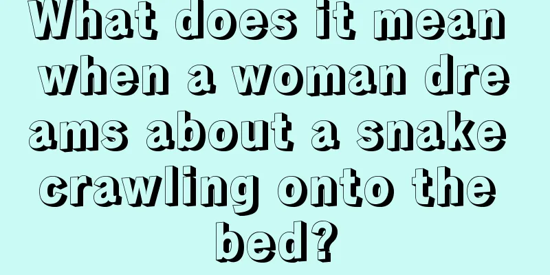 What does it mean when a woman dreams about a snake crawling onto the bed?