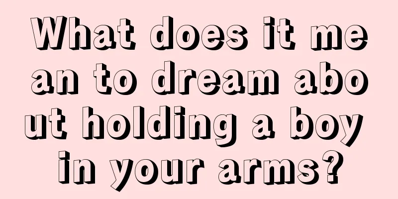 What does it mean to dream about holding a boy in your arms?