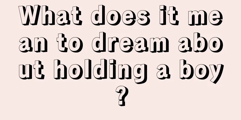 What does it mean to dream about holding a boy?