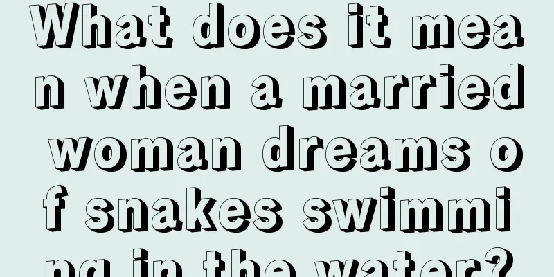 What does it mean when a married woman dreams of snakes swimming in the water?