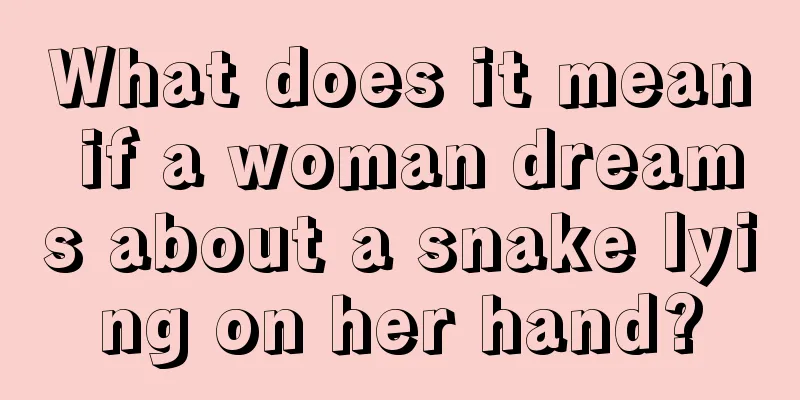 What does it mean if a woman dreams about a snake lying on her hand?