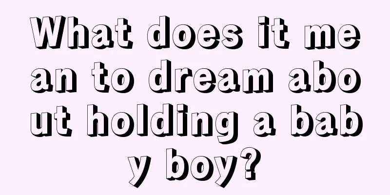 What does it mean to dream about holding a baby boy?